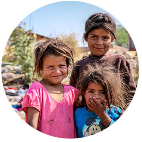 a group of children standing next to each other