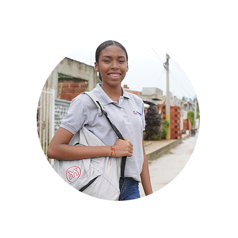 a young woman smiling and carrying a backpack