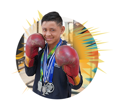 a young man wearing boxing gloves